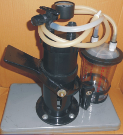 VERTICLE FOOT SUCTION WITH90MM HEAVY DUTY PISTON PUMPMOUNTED OVER A GLASS FILLEDNYLON PLASTICBASE WITH2X750ML/600ML PC JAR
